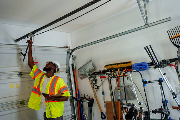 Professional Garage Door Panel Replacement technician working in Mountainair, NM